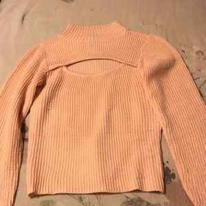 A pink sweater